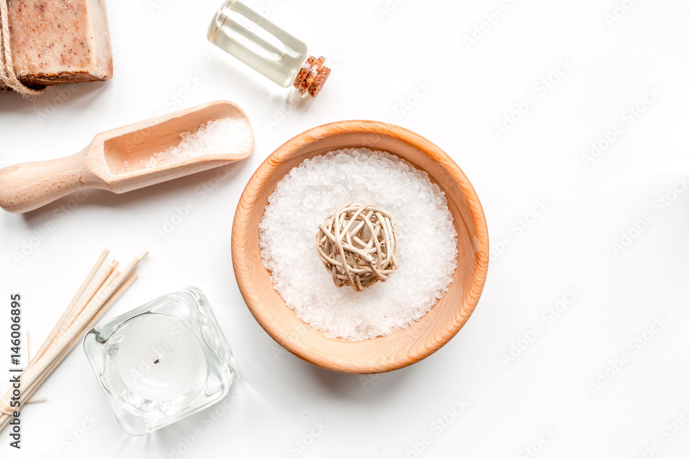 spa cosmetics with soap, salt, oil top view space for text