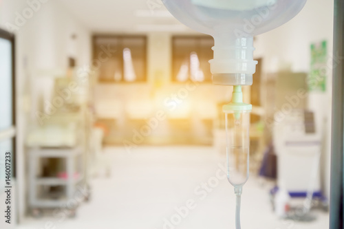 Close up 0.9   Normal saline solution or sodium chloride drip for patient and infusion pump at Emergency  operating room in hospital by doctor Medical corridor concept with copy space  vintage color
