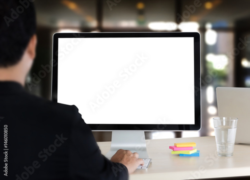 young man working Businessman using a desktop computer of the blank screen