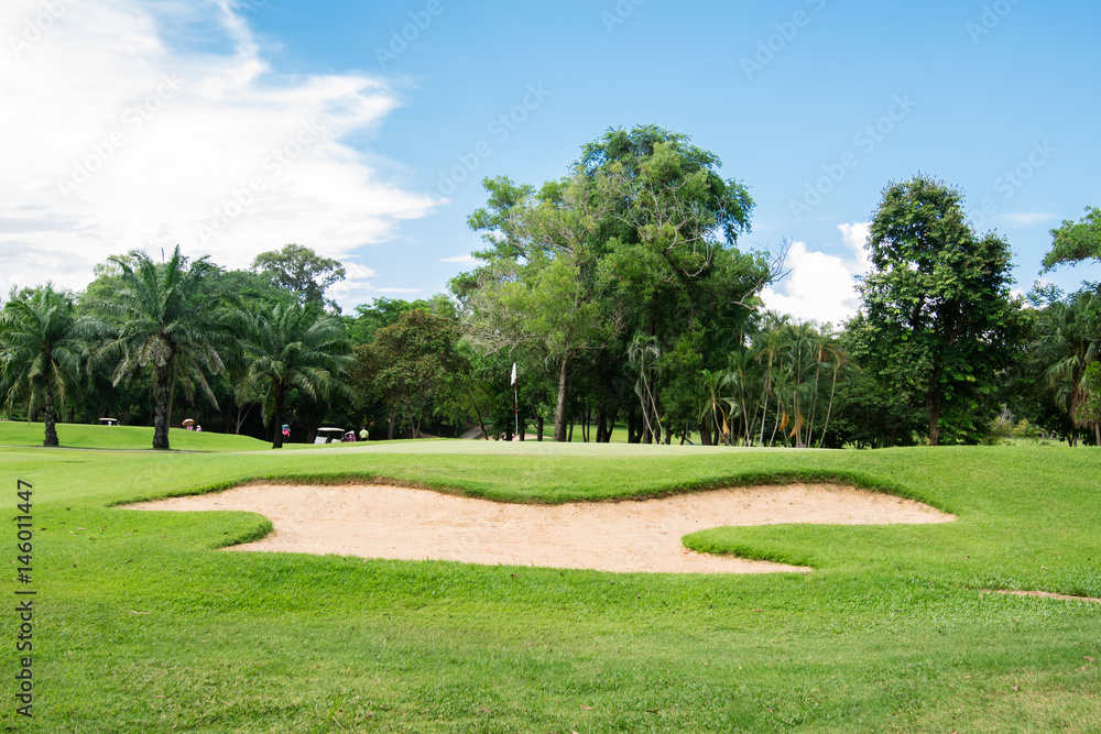 Golf course, sand pit.