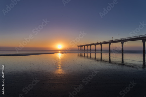Sunrise at New Brighton in Christchurch, New Zealand © Thiwathphon
