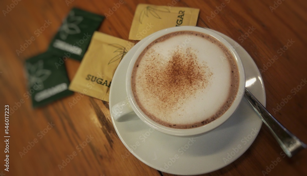 A glass of hot cocoa in the cafe. A glass of hot cocoa in the cafe.
