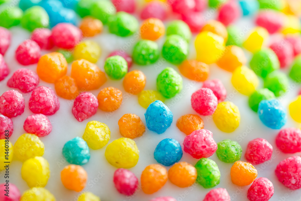 Balls of different colors on a white glaze.Background. Balls of different colors on a white glaze.Background.