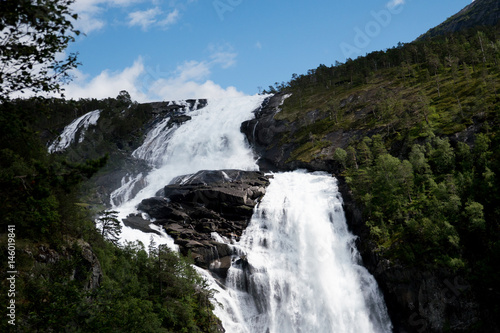 Fototapeta Naklejka Na Ścianę i Meble -  Waterfall in mountains of Norway in rainy weather.