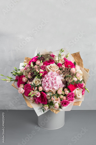 Still life with a bouquet of flowers. the florist put together a beautiful bunch of flowers. Man manual work used different types of flowers and colors. copy space photo