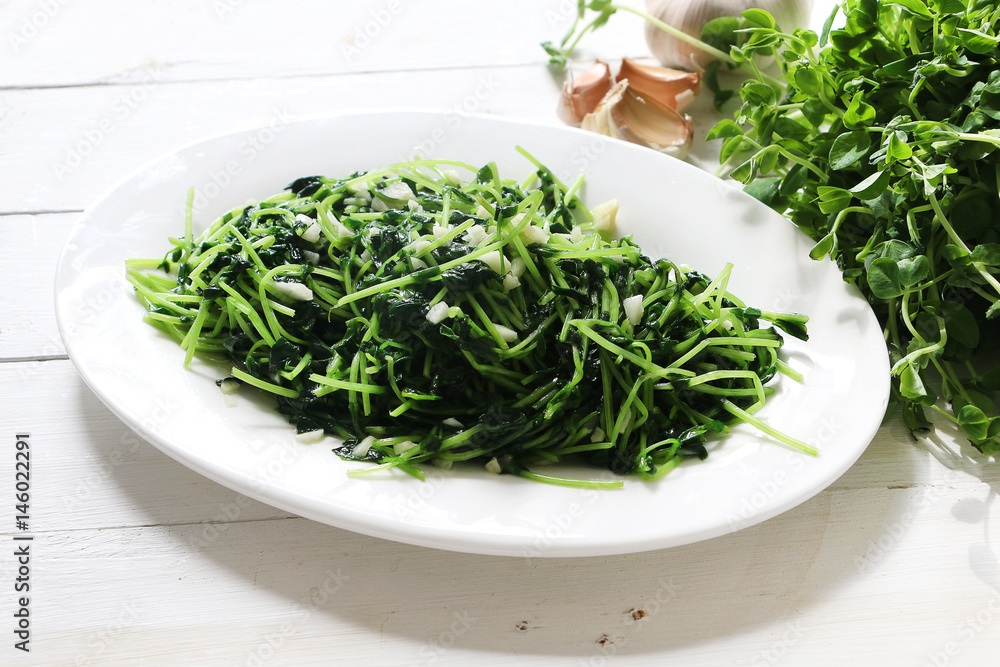 Chinese cuisine, Stir fry sweet bean sprout with garlic Chinese cuisine, Stir fry sweet bean sprout with garlic
