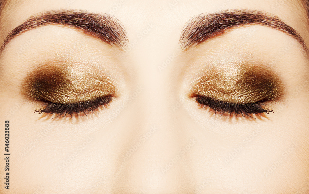 Fototapeta premium Eye Makeup. Beautiful Eyes Glitter Make-up. Holiday Makeup detail.