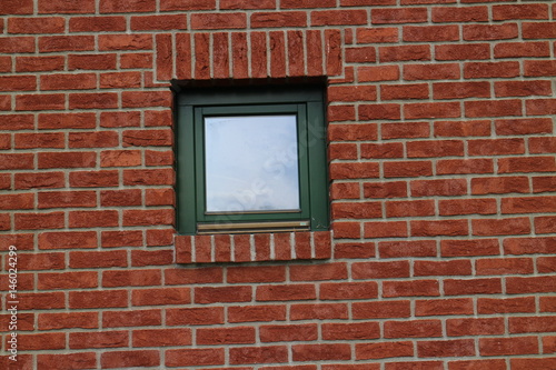 Window in facade of horse barn in Háj ve Slezsku, Czech republic