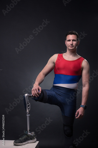 man sportsman athlete posing, prosthetic leg
