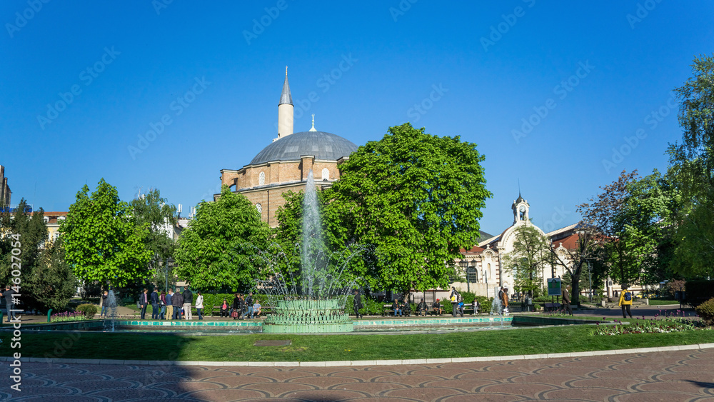 Garden / Park Central bathroom with fountain against the backdrop of Central Sofia Mosque - Banya Bashi Mosque. Bulgaria