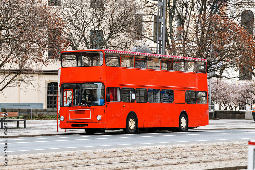 Obraz premium red double decker tourist bus on the europe street