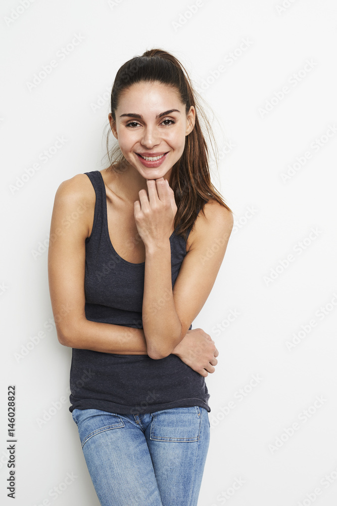 Smiling brunette in studio, portrait Smiling brunette in studio, portrait