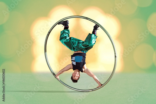 Circus artist in a Cyr Wheel
