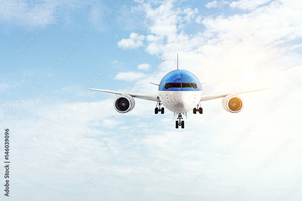 Fototapeta premium Airplane in day sky. Mixed media