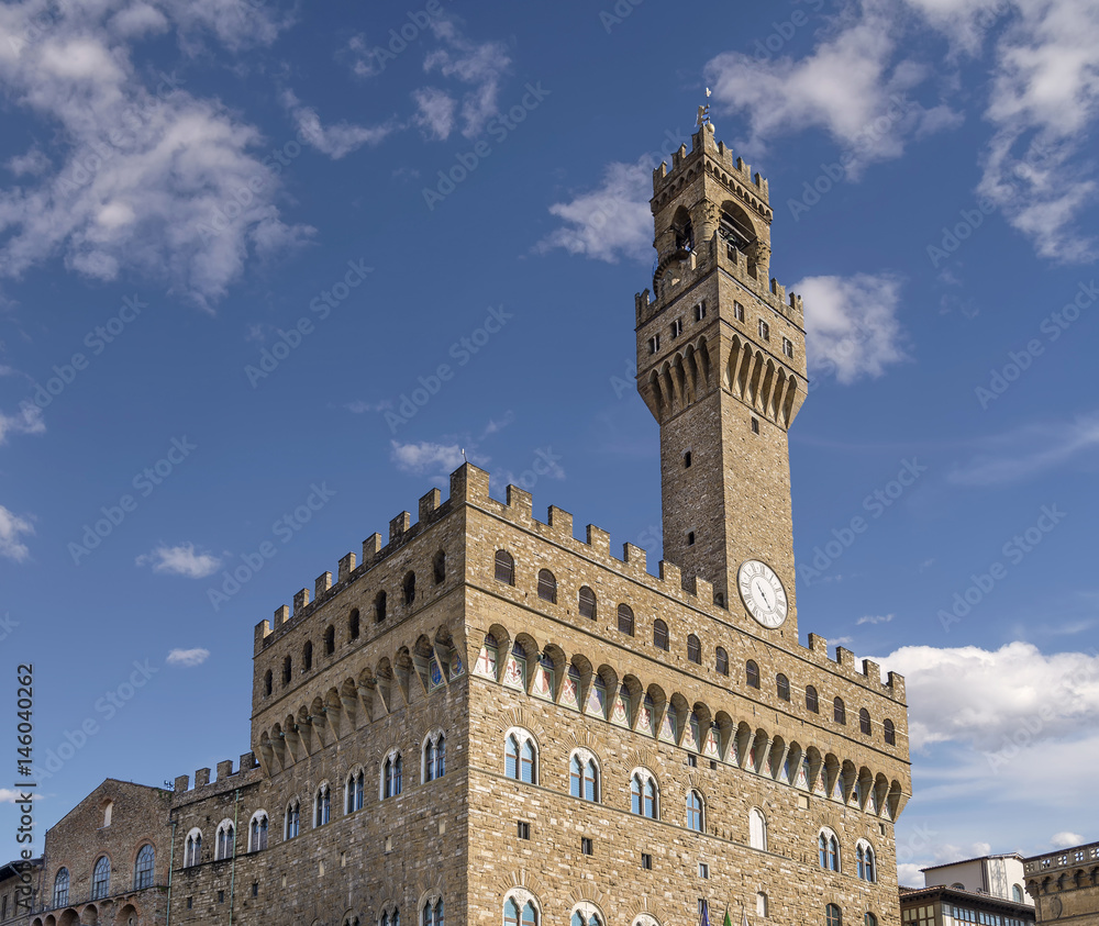 Detail of the famous Palazzo Vecchio palace in Piazza della Signoria in Florence, Italy, on a sunny day