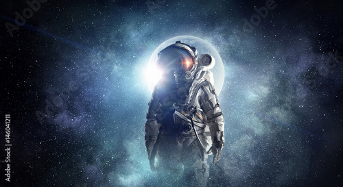 Fototapeta Naklejka Na Ścianę i Meble -  Astronaut in outer space. Mixed media