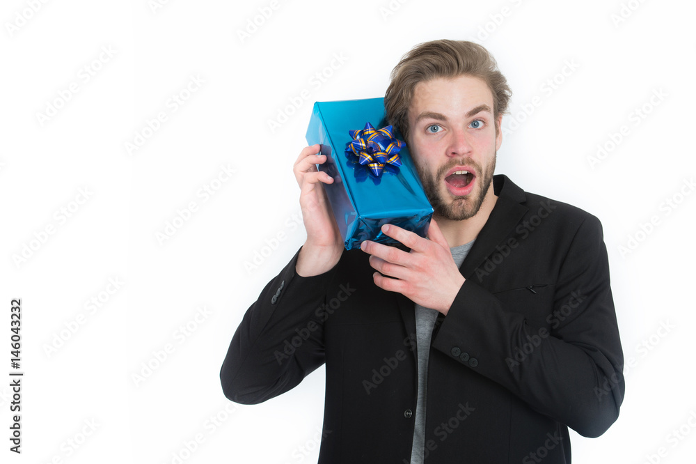 handsome happy businessman holding blue gift box handsome happy businessman holding blue gift box