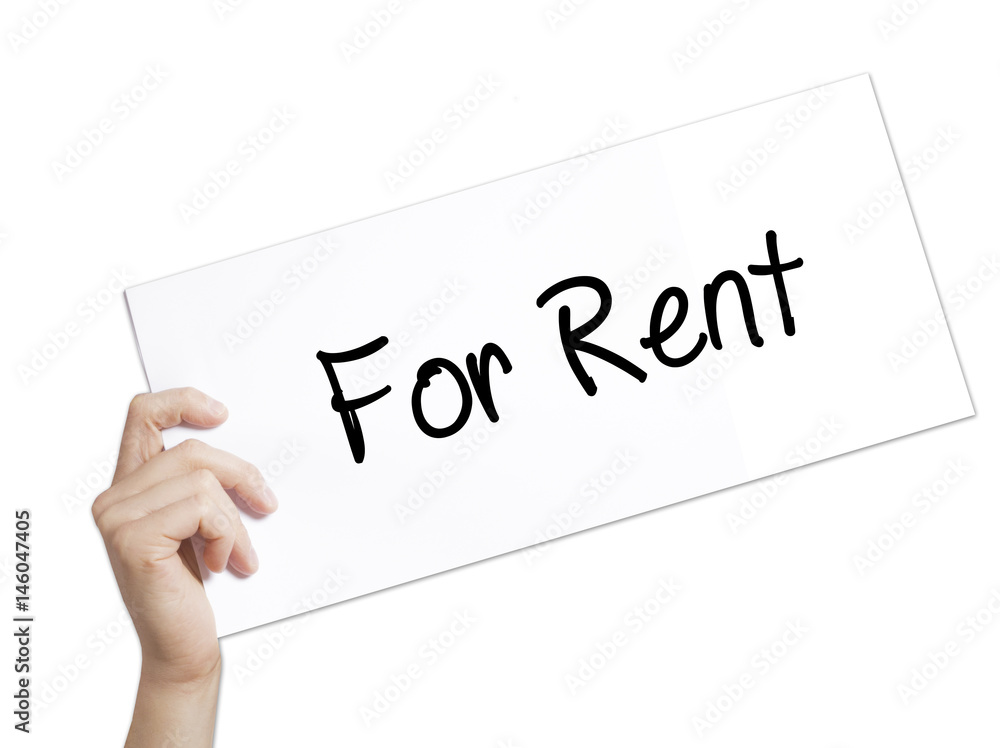 For Rent Sign on white paper. Man Hand Holding Paper with text. Isolated on white background For Rent Sign on white paper. Man Hand Holding Paper with text. Isolated on white background
