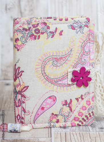 Notebooks, planners and photo albums in scrapbooking style with colorful pages