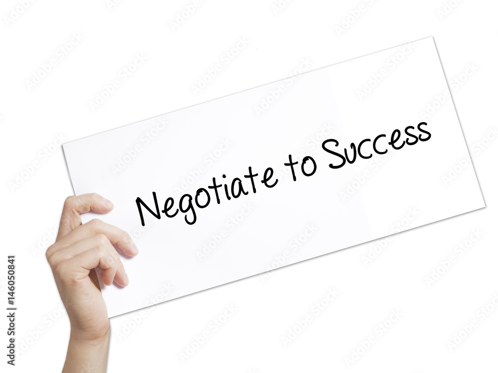Negotiate to Success Sign on white paper. Man Hand Holding Paper with text. Isolated on white background Negotiate to Success Sign on white paper. Man Hand Holding Paper with text. Isolated on white background
