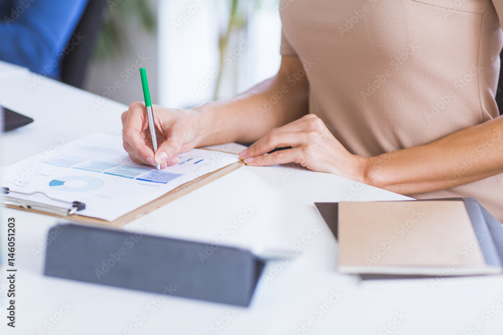 Businesswoman Working in Office Businesswoman Working in Office