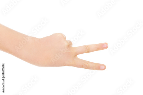 Woman hand shows two fingers - victory sign