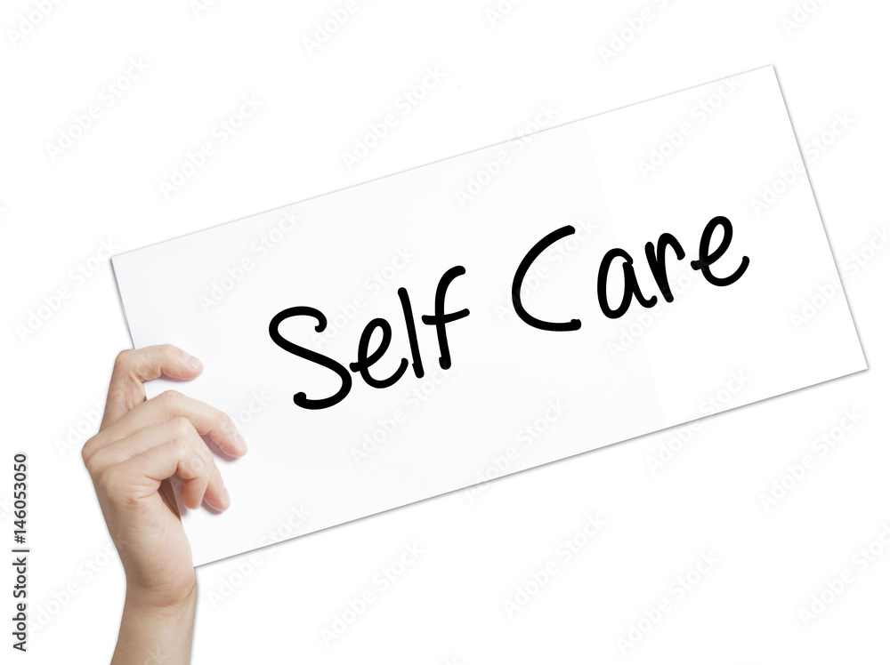 Self Care Sign on white paper. Man Hand Holding Paper with text. Isolated on white background Self Care Sign on white paper. Man Hand Holding Paper with text. Isolated on white background