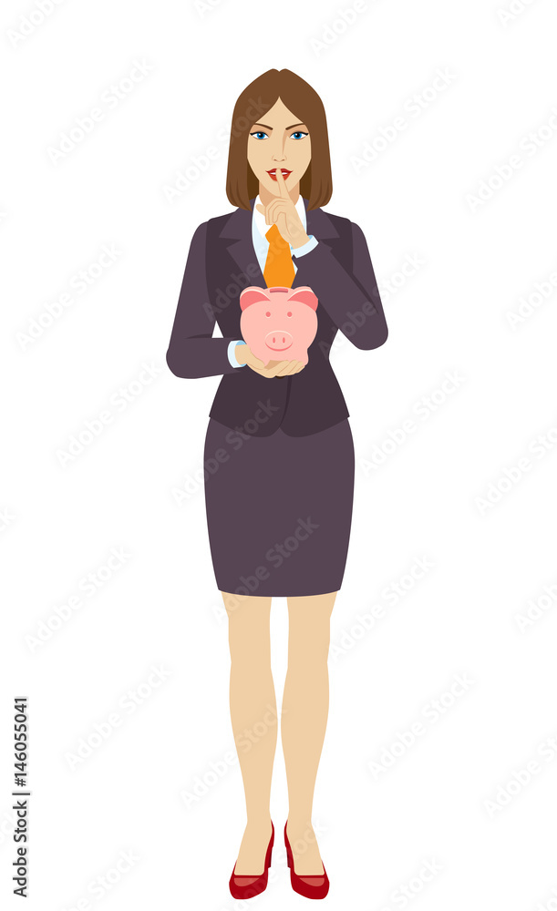 Businesswoman holding a piggy bank and showing hush-hush sign Businesswoman holding a piggy bank and showing hush-hush sign
