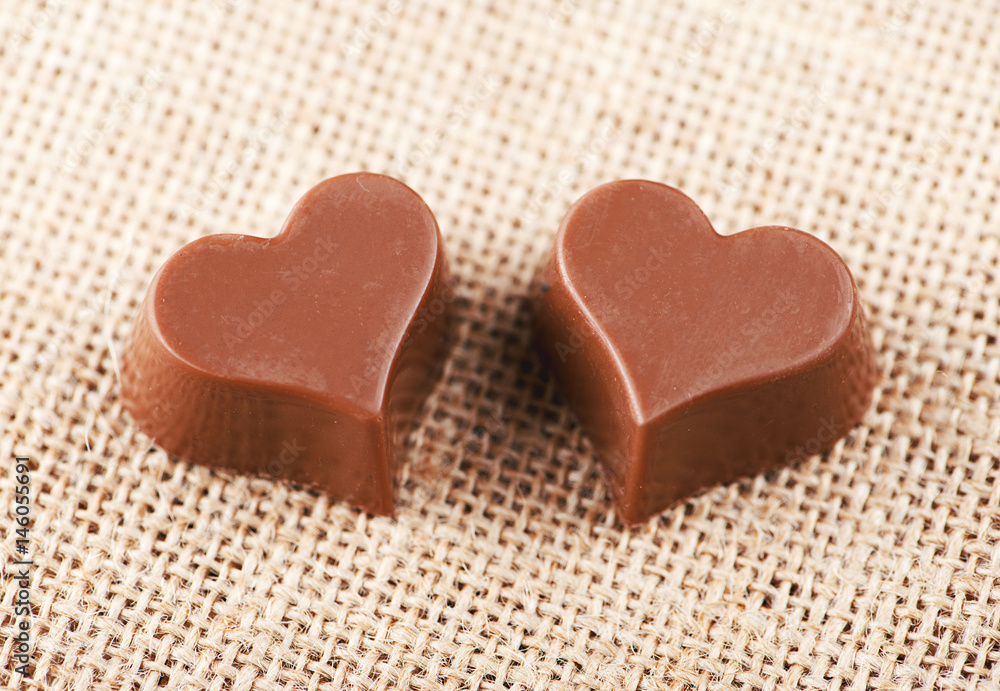Heart shaped candies on canvas. Heart shaped candies on canvas.