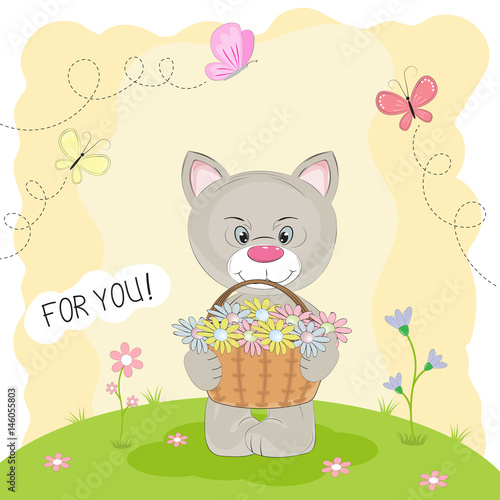 Greeting card kitty in the meadow carrying a basket of flowers.