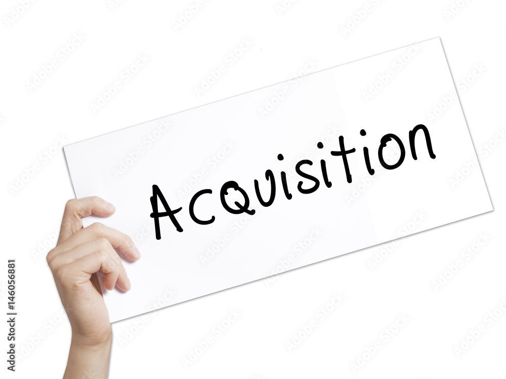 Acquiring Sign on white paper. Man Hand Holding Paper with text. Isolated on white background Acquiring Sign on white paper. Man Hand Holding Paper with text. Isolated on white background