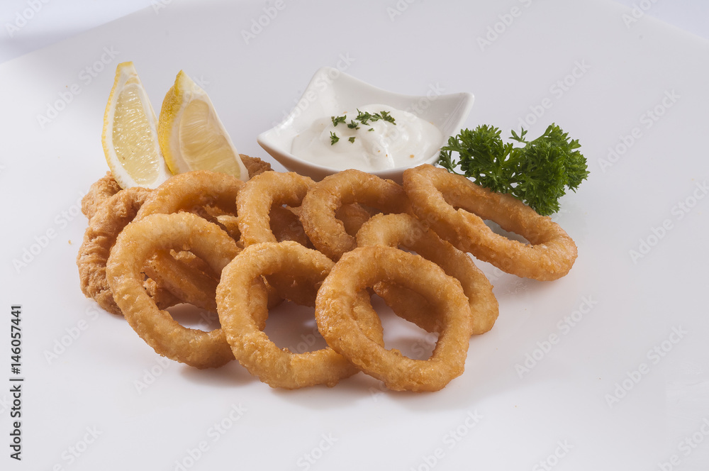 calamari squid rings with lemon & mayonise calamari squid rings with lemon & mayonise