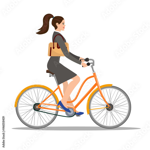 Fototapeta Naklejka Na Ścianę i Meble -  beautiful woman in dress rides a bicycle