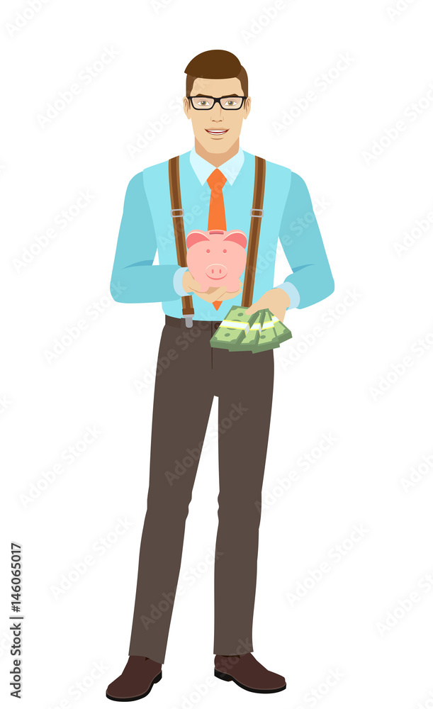 Businessman with cash money holding a piggy bank Businessman with cash money holding a piggy bank