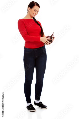 Happy beautiful student woman holding wallet