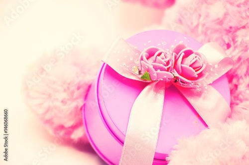 Pink gift box in round shape