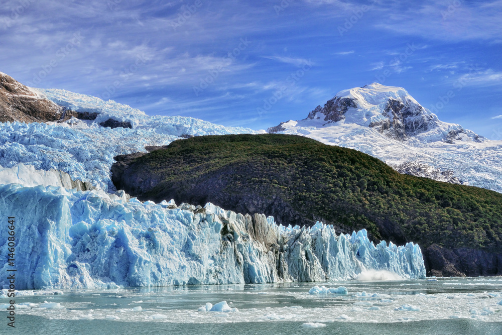  Blue iceberg and clouds in El Calafate, Patagonia, Argentina