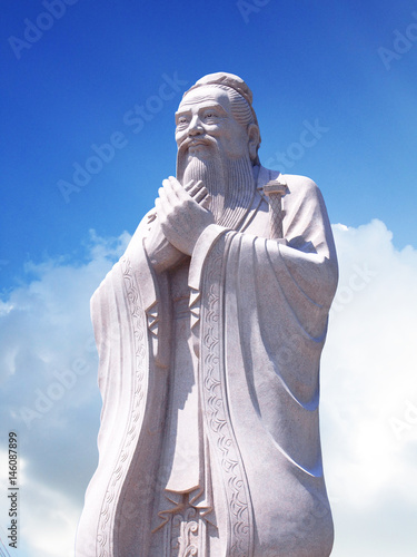 Confucius statue with sky background