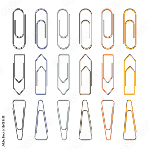 Set of different metal paper clips on white