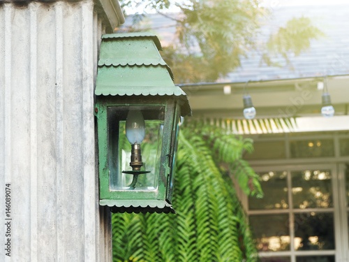 Картината върху платно Vintage lamp decorate the garden.