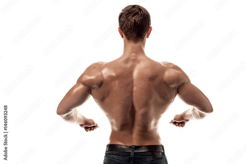 Strong Athletic Man Fitness Model posing back muscles, triceps over white background. Copy space Strong Athletic Man Fitness Model posing back muscles, triceps over white background. Copy space