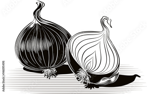 Red onion whole and one cut in half.