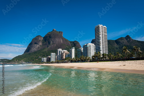Fototapeta Naklejka Na Ścianę i Meble -  Beautiful Sao Conrado Beach View With Mountain Landscape and Luxury Apartment Buildings