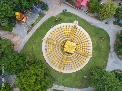 aerial view. group of golden pagodas inside the big forest at Wat Pa Sawang Bun Pulic Temple in saraburi province the middle part of thailand