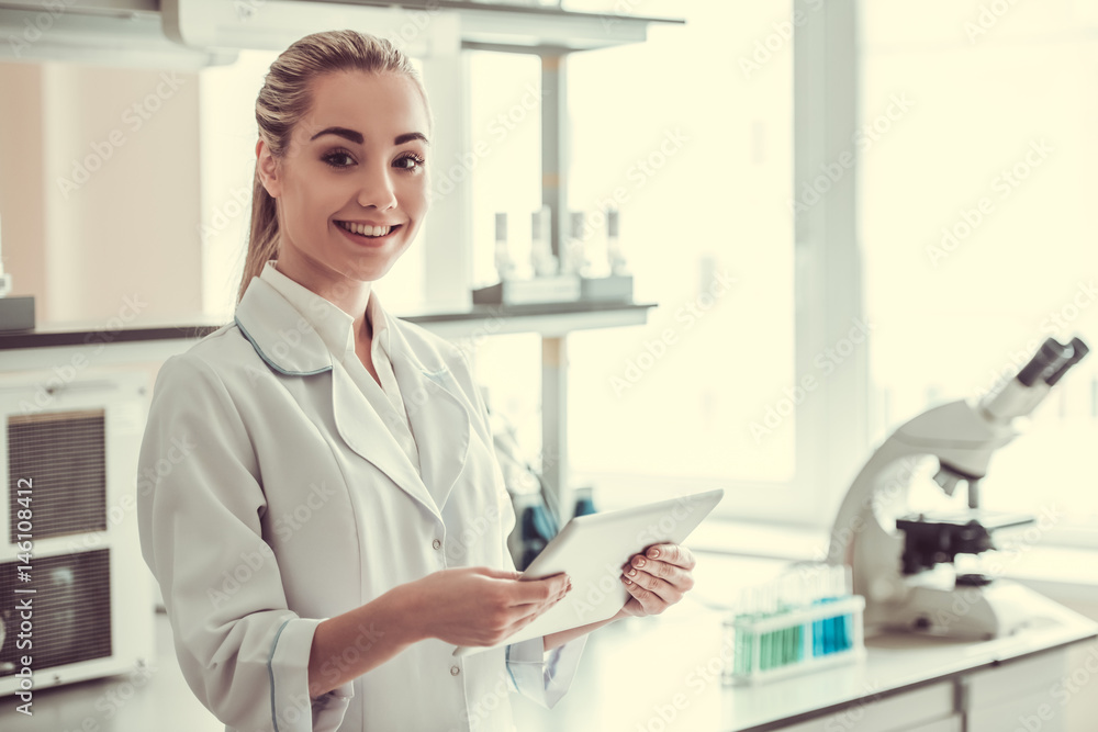 Beautiful female doctor in laboratory