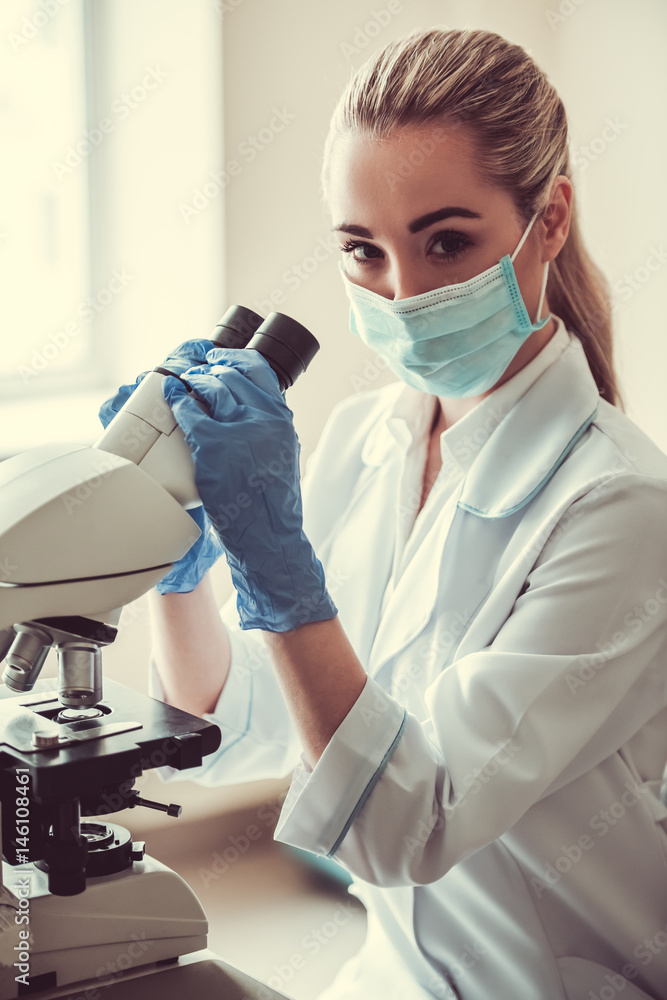 Beautiful female doctor in laboratory Beautiful female doctor in laboratory