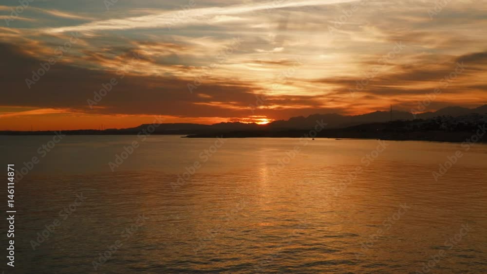 Clouds at sunset over the sea, sunset over the sea. On the horizon of the mountain. Sinai Egypt Clouds at sunset over the sea, sunset over the sea. On the horizon of the mountain. Sinai Egypt