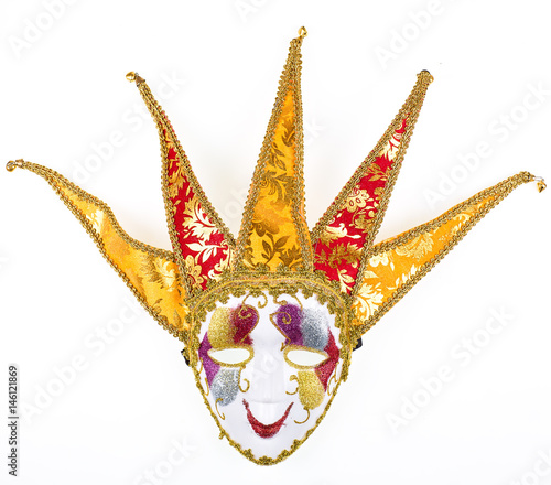 Carnival venetian mask of a harlequin on a white isolated background