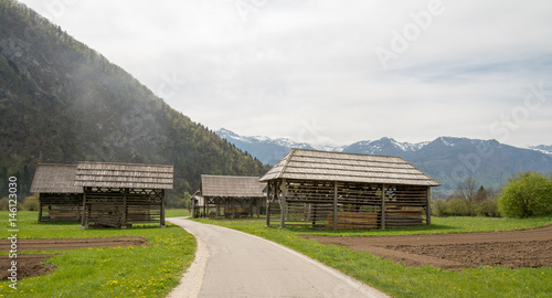 Traditional wooden double hayrack in Bohinj, Slovenia during spring time photo