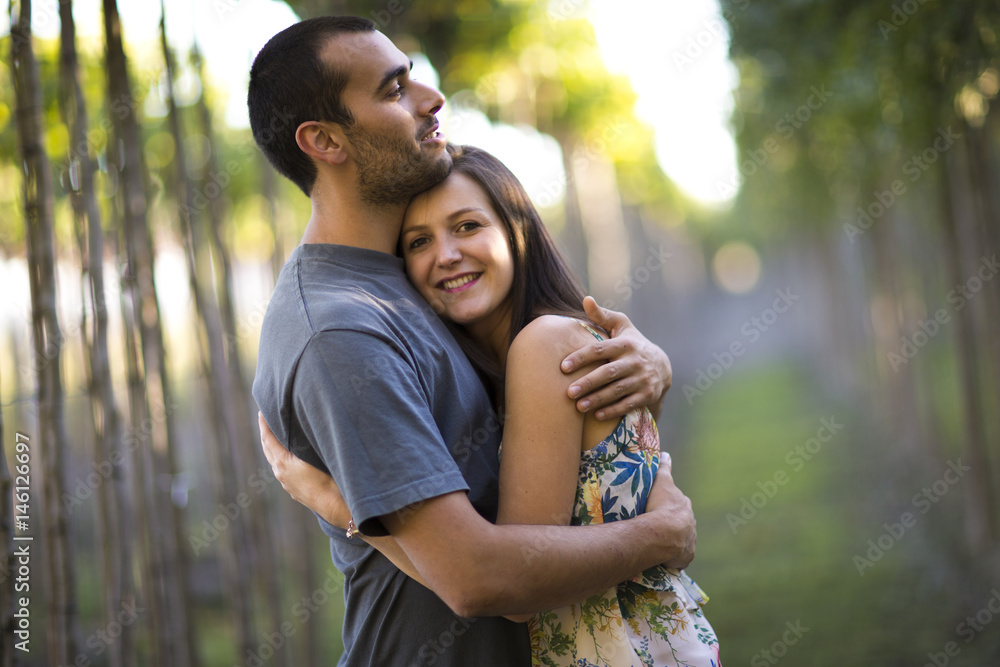 Happy young couple in love outdoor in summer Happy young couple in love outdoor in summer